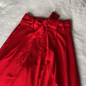 Red wide leg pants with bow. Has great weight, so flattering.